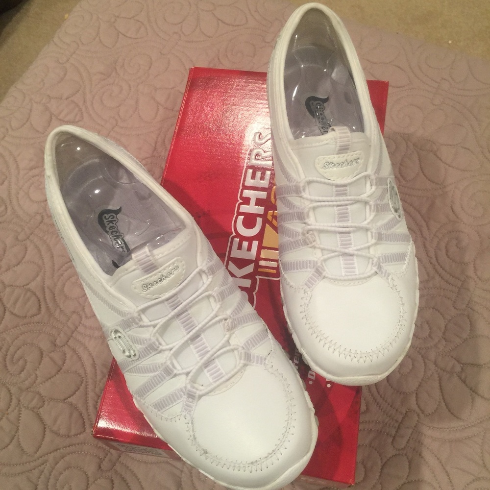 White Slip on Sketcher Tennis Shoes